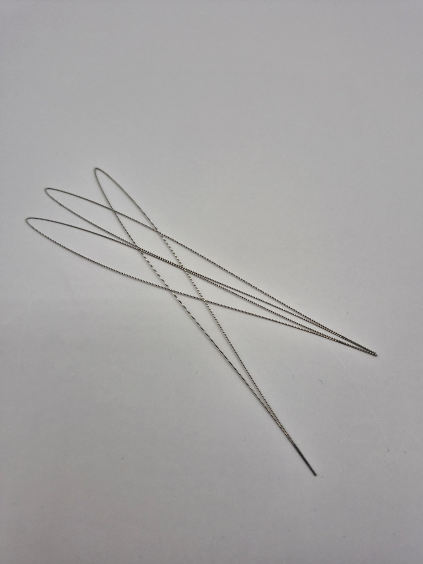 Rounded Wire Loops – beads and loops for hair extension installation by Kelly Maxwell Hair Extensions