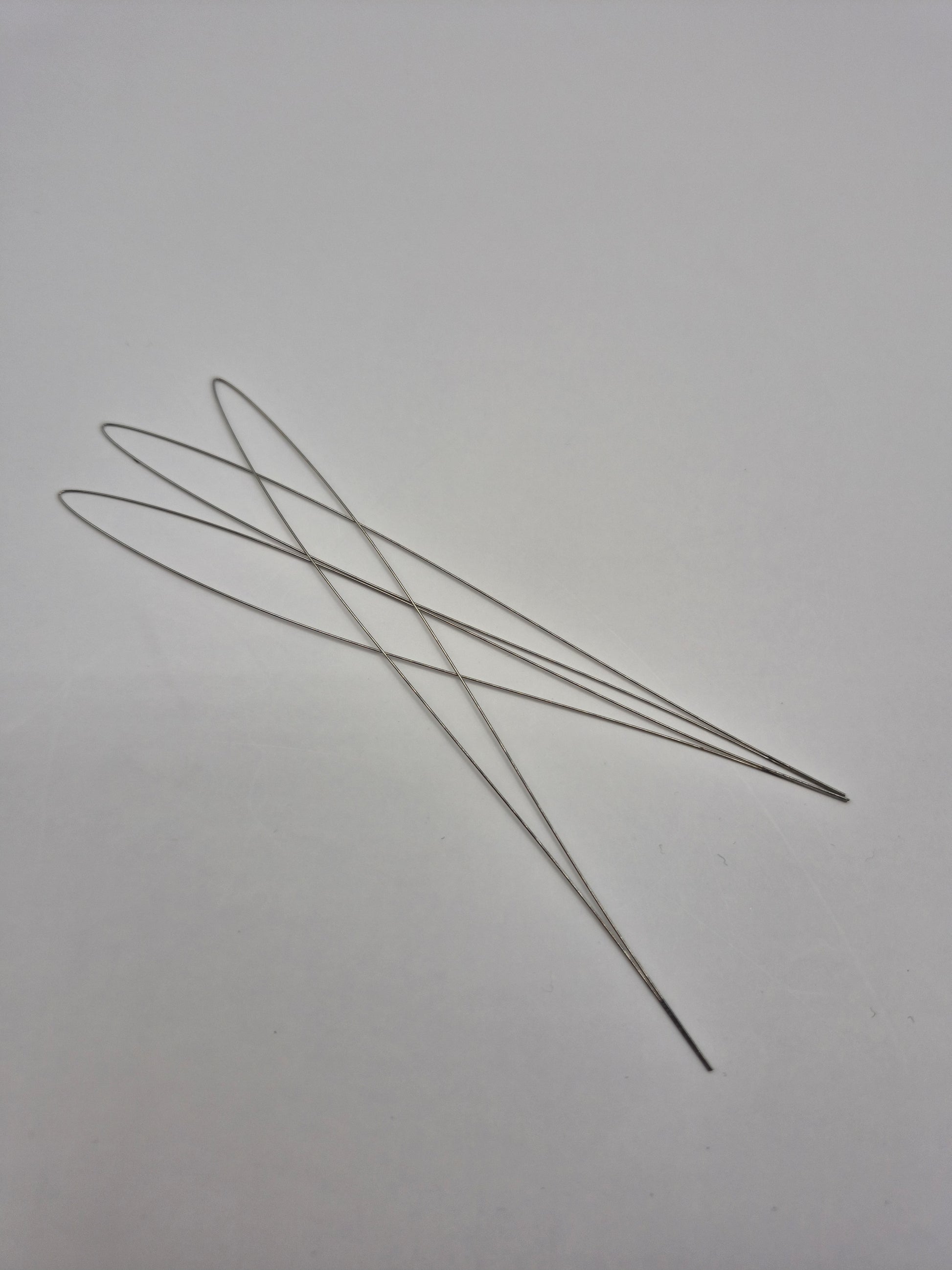 Rounded Wire Loops – beads and loops for hair extension installation by Kelly Maxwell Hair Extensions