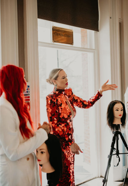 Educator demonstrating on a mannequin in class