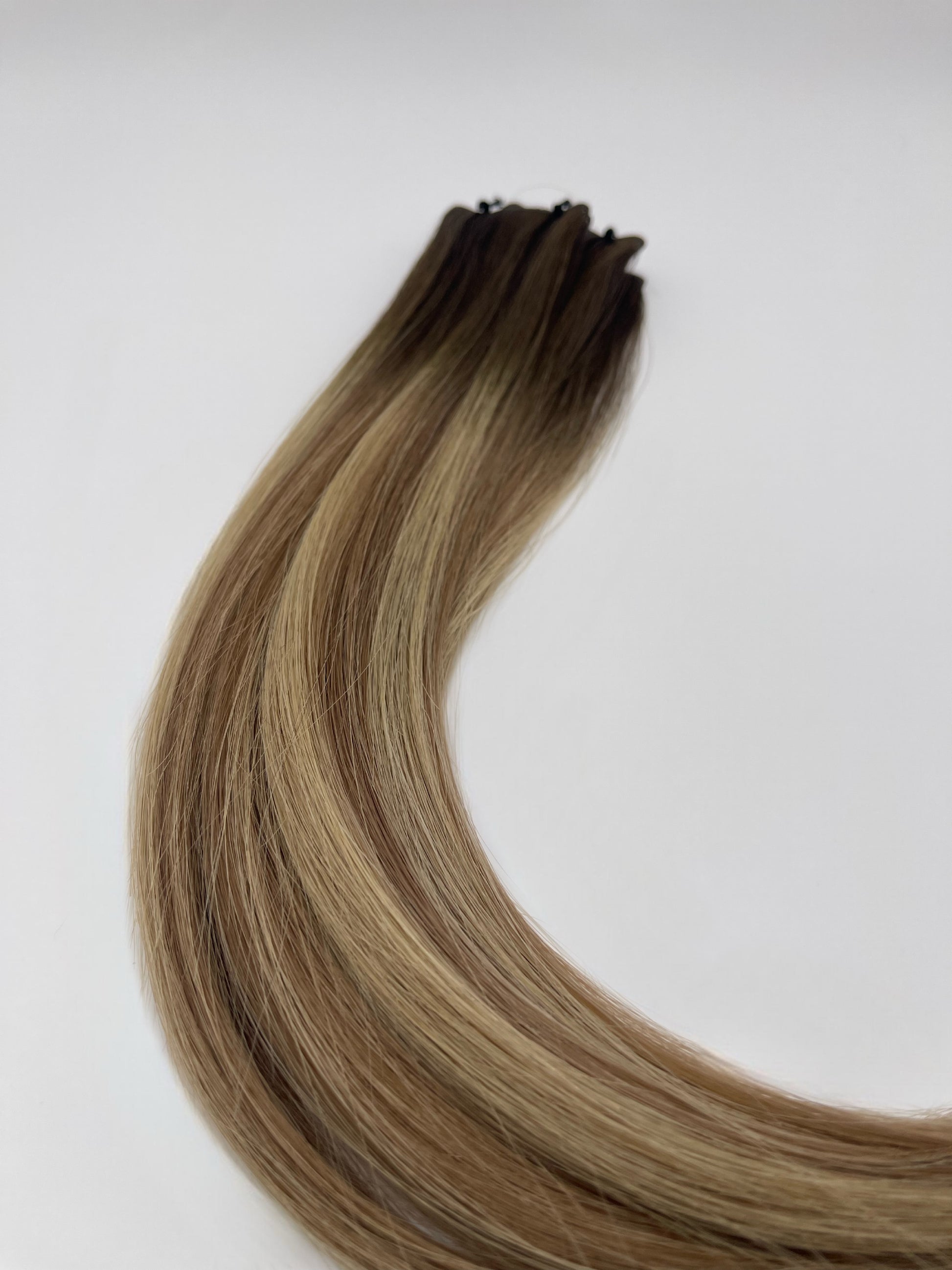 Unstoppable (9) – 100% human Remy hair extension wefts by Kelly Maxwell Hair Extensions
